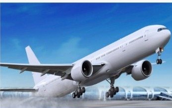 Aircraft lifting off against a bright sky